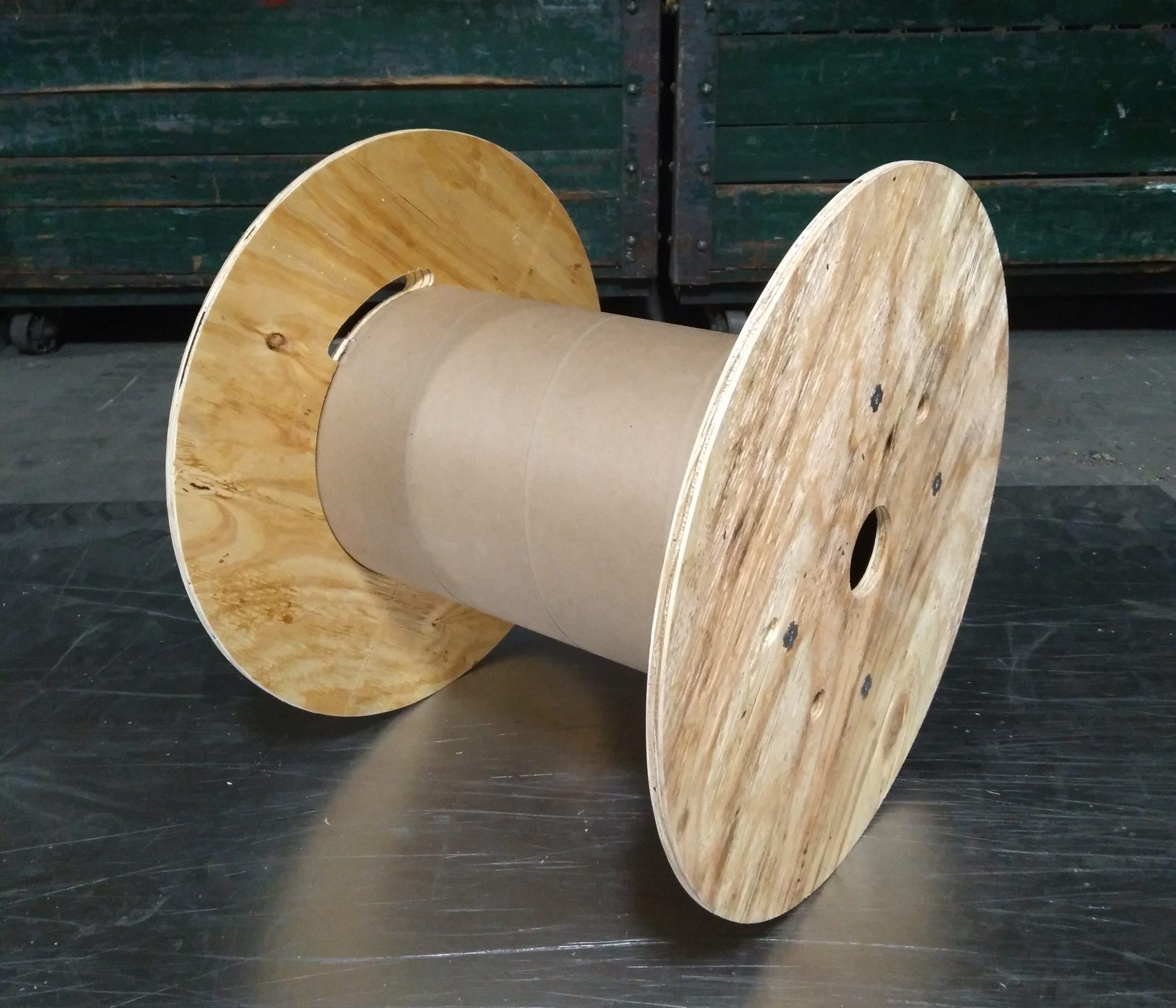 Plywood reel with paper core and custom slot